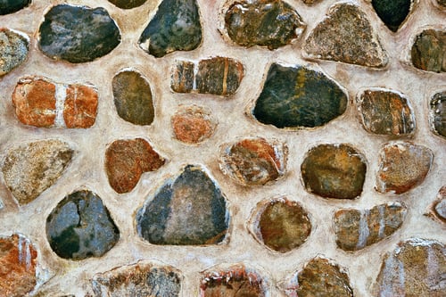 Preview: Abstract Spotted Texture Of Stone And Concrete Wall Close-Up For Background Or Wallpaper