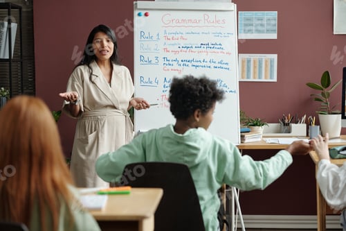 Preview: Teacher in front of whiteboard