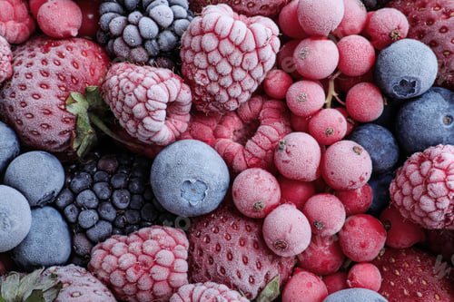 Preview: Mix of different frozen berries as background, top view