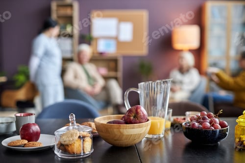 Aperçu: Background image of breakfast table with fruit and pastry at retirement home
