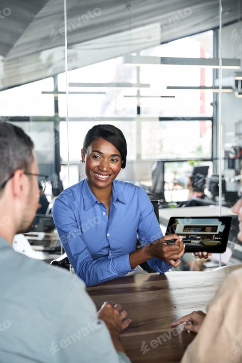 Preview: African architect or bank manager consulting couple home buyers about mortgage.