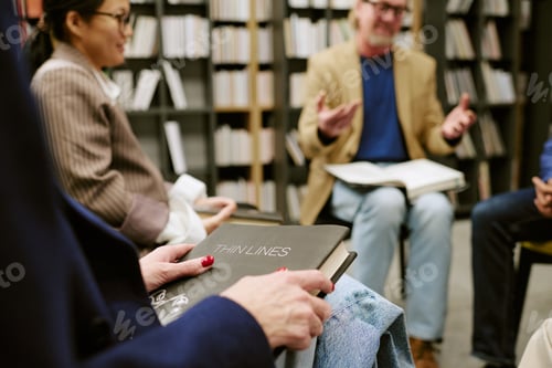 Preview: Caucasian Middle Aged Woman Holding Book during Novel Presentation