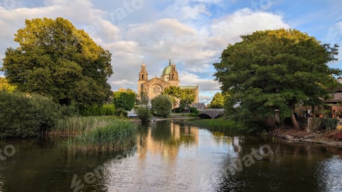 Preview: Galway cathedral reflected in the Corrib river in Galway city, Ireland, Irish landmark, buildings an