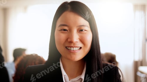 Preview: Happy Asian business woman working inside finance bank modern office