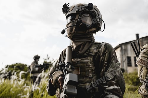 Preview: Armed Professional in Camouflage with Tactical Gear Outdoors