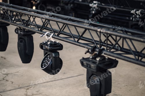 Preview: Professional lighting equipment hanging on a truss system