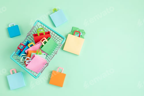Preview: Shopping basket full of paper bags. Sesonal sale, online deals, discounts, promotions idea