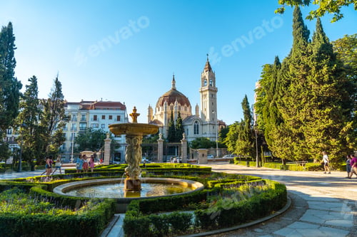 Preview: San Manuel y San Benito Parish seen from the Retiro Park in the city of Madrid. Spain in summer