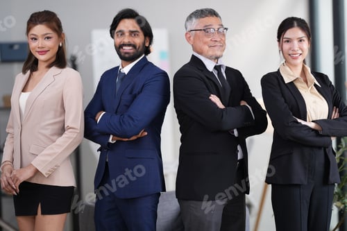 Preview: Group of executive staff standing diligently and politely