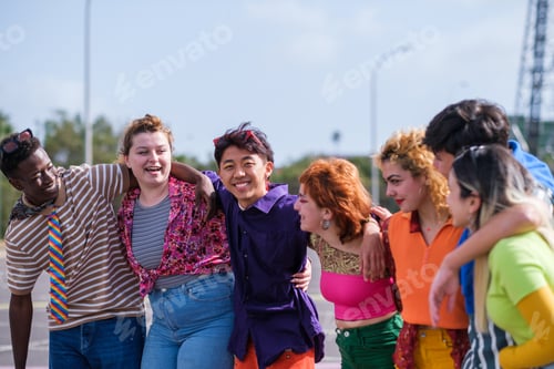 Preview: Group of teenagers having fun in colorful clothes