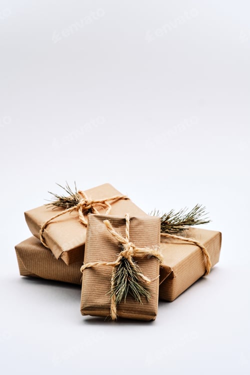 Preview: Christmas gift packages wrapped in kraft paper