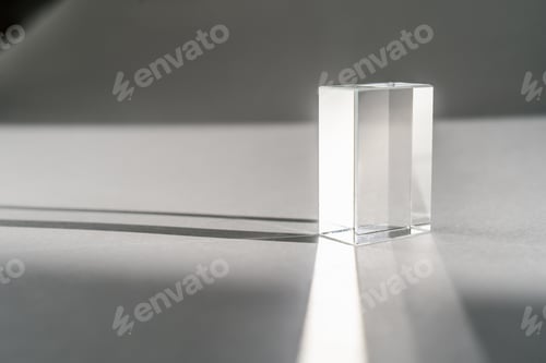 Preview: Transparent crystal prism on a white background.
