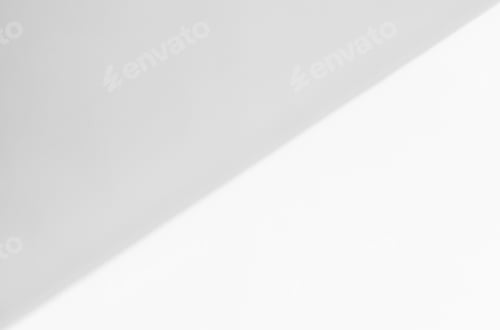 Preview: White wall with shadow overlay. Sunlight effect shadow on the wall.