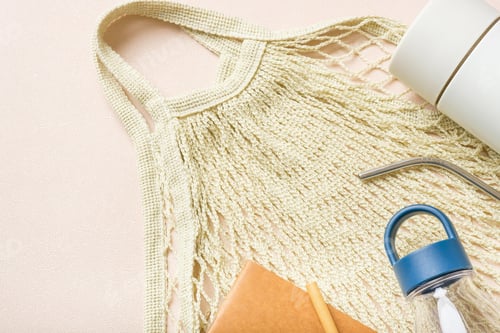 Preview: Eco-Friendly Items Laid on Textured Background