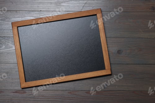 Preview: Blank small blackboard on wooden background, top view