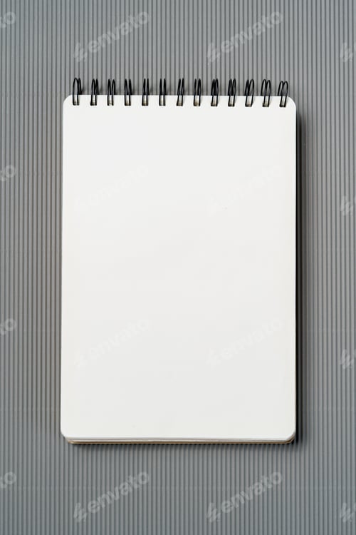 Open Blank Notepad on a Gray Background