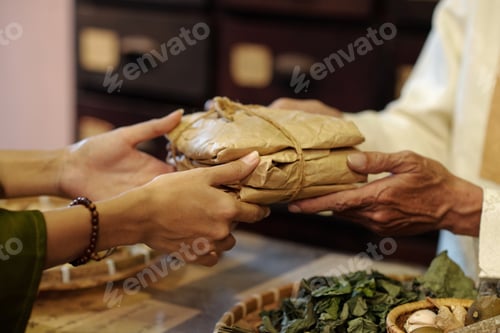 Preview: Customer Buying Herbs In Drug Store