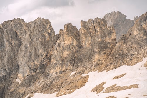 Preview: Scenery Alps with white snow on rocky mountain