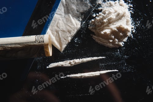 Preview: Hard drugs on black table. Close up.