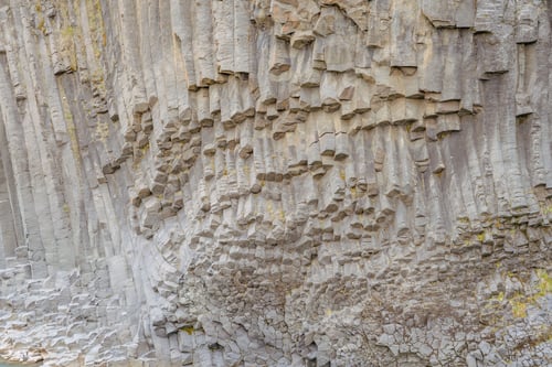 Preview: Natural rock formations resembling columns in Iceland's landscape