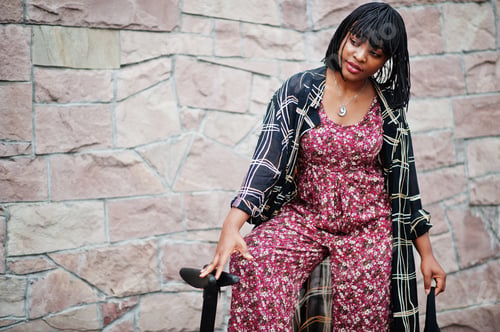 Preview: African american woman using segway or hoverboard