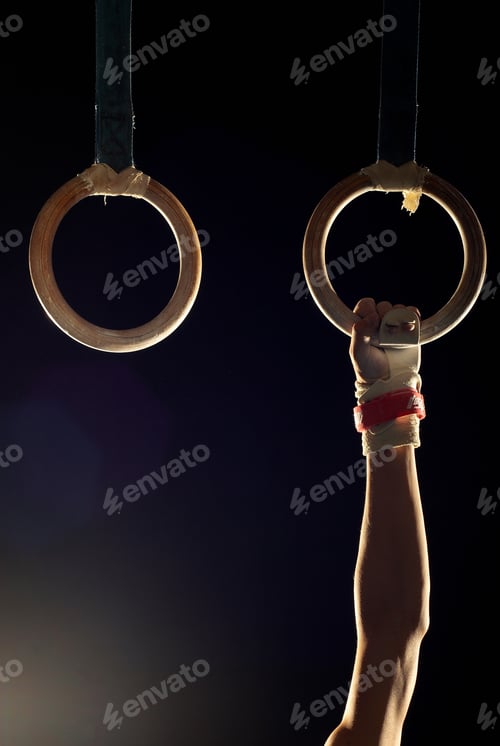Preview: gymnast holding one ring