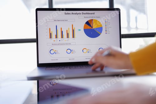 Preview: Businesswoman working and calculating on digital financial dashboard, planning business growth,
