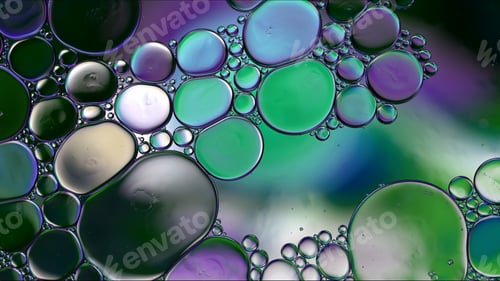 Preview: Abstract Colorful Food Oil Drops Bubbles and spheres Flowing on Water Surface