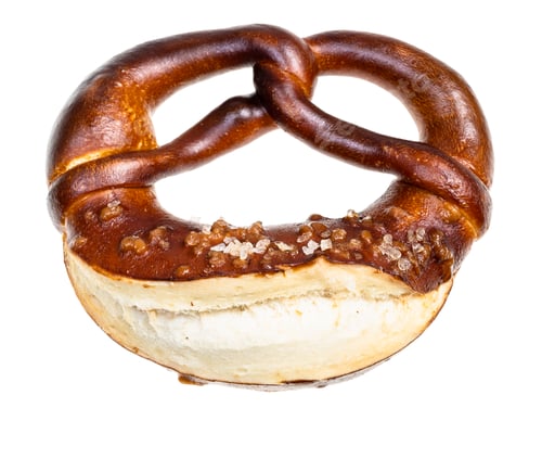 Preview: bretzel with salt crystals isolated on white