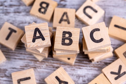 Preview: Wooden alphabet on the wooden table