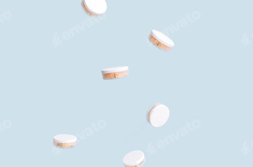 Preview: Plastic cans of non-smoking tobacco products fall down against a blue background