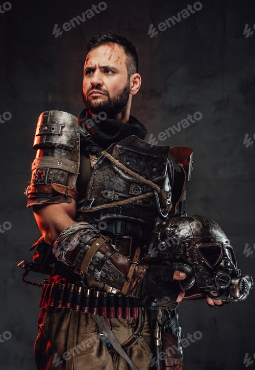 Preview: Serious and also brutal apocalyptic soldier in armour holding helmet