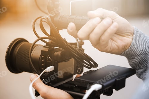 Preview: Videographer with a modern mirrorless camera rig