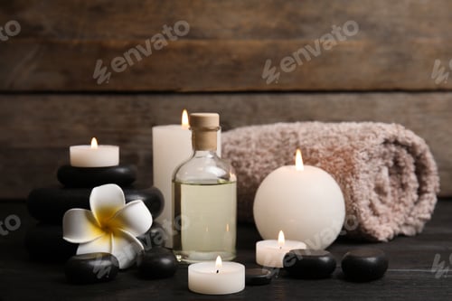 Preview: Spa composition with candles on wooden table