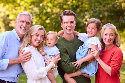 Preview: Portrait Of Multi-Generation Family Enjoying Walk In Countryside Together