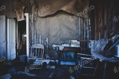 Preview: Abandoned house with old furniture and dilapidated walls and ceiling in a ghost town