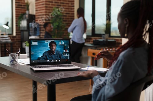Preview: Research and development company team leader in videocall remote conference with CEO.
