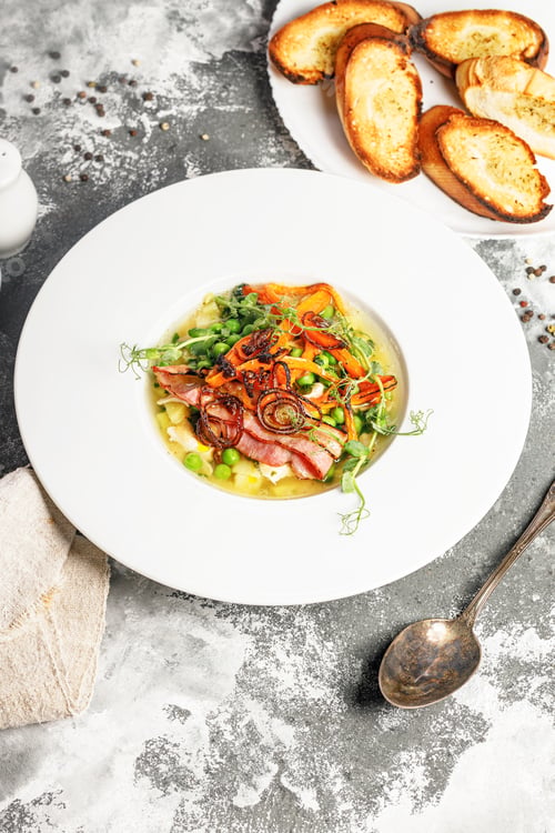 Preview: Pea soup. Delicious vegetable soup with green peas, carrots and fried bacon