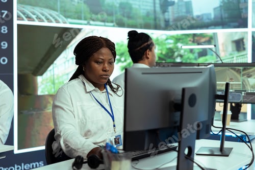 Preview: African american agency associate monitoring traffic activity