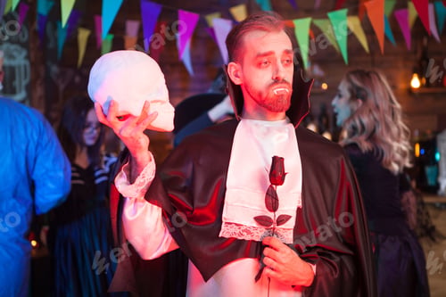 Preview: Handsome man dressed in a Dracula costume for halloween