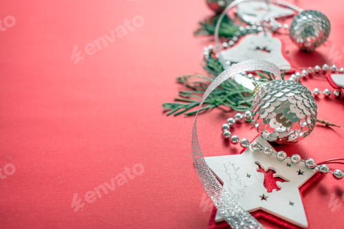 Preview: Christmas composition, mockup on red background. Christmas white and silver ribbon, gift box