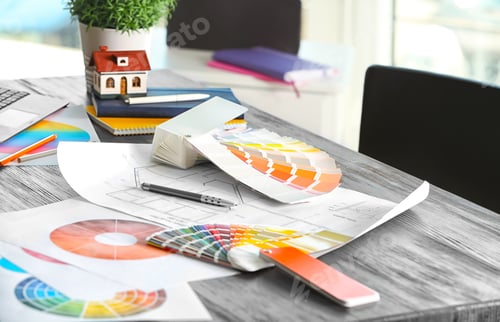 Preview: Color palette samples and house plan on table