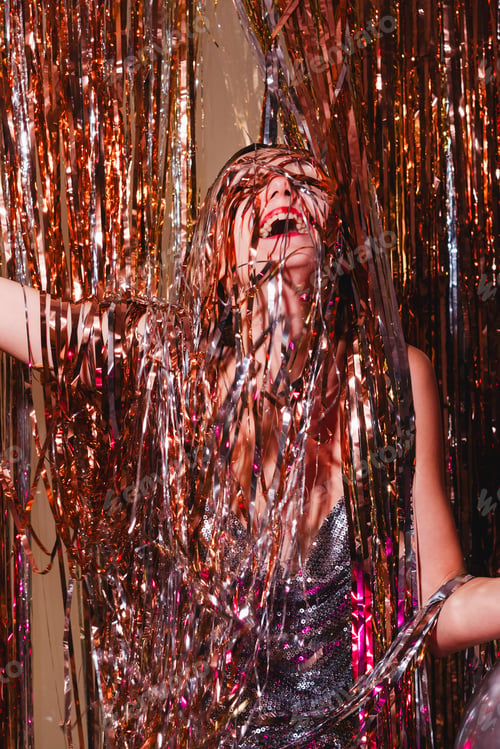 Preview: Happy woman celebrating New Year.