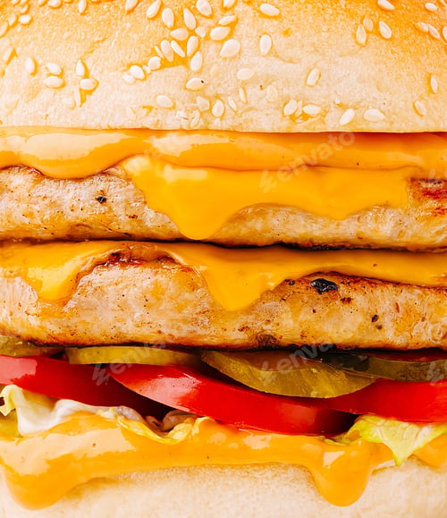 Preview: Juicy double cheeseburger with melted cheese and fresh toppings