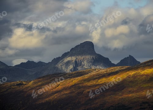 Preview: Dramatic light and clouds over mountain peaks of northern norway