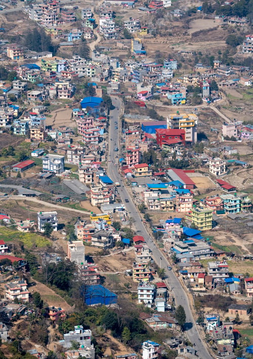 Preview: Aerial view of a bustling cityscape with traffic on roads in Kathmandu, Nepal.