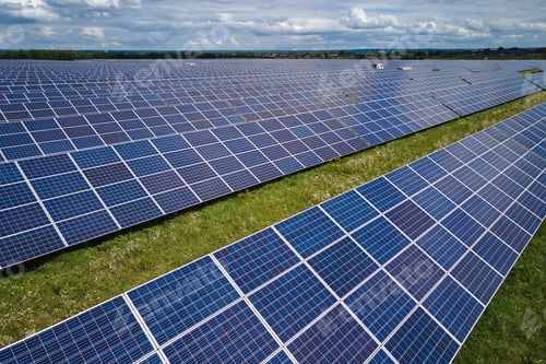 Preview: Aerial view of large sustainable electrical power plant with rows of solar photovoltaic panels