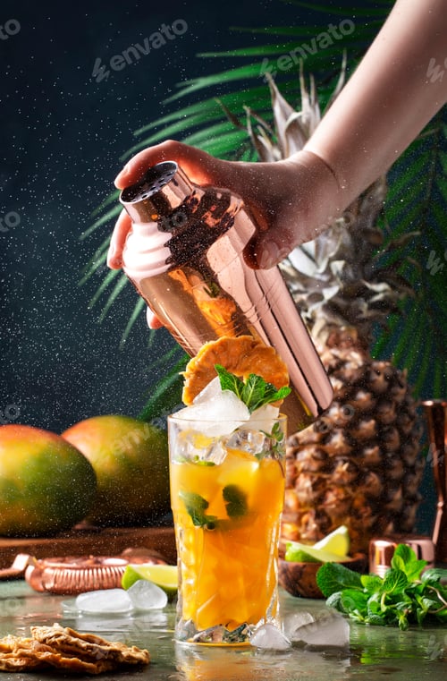 Preview: Summer cocktail with vodka, pineapple juice, mango/ Bartender shakes copper shaker