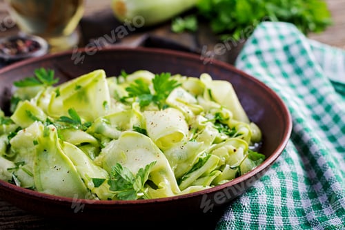 Preview: Salad of marinated zucchini in spices. Vegan food. Healthy meal.