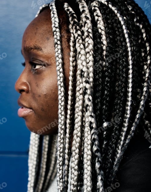 Preview: Portrait of black woman with dreadlocks hair